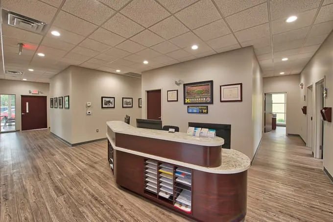 Reception front desk and hallway at Allergy & Asthma Physicians of Commerce Township