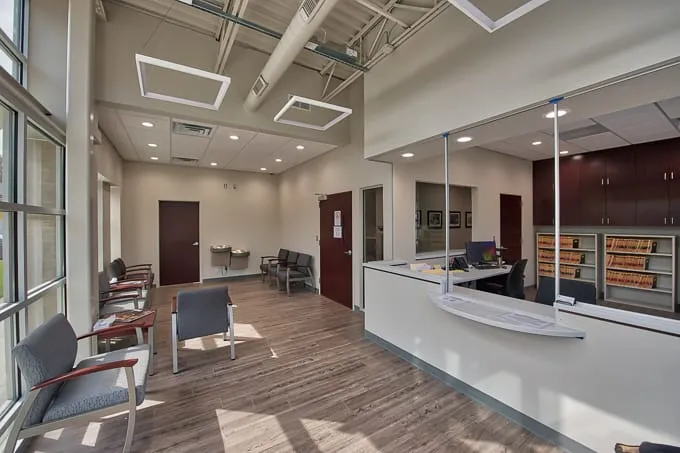 Waiting room and reception desk at Allergy & Asthma Physicians of Commerce Township